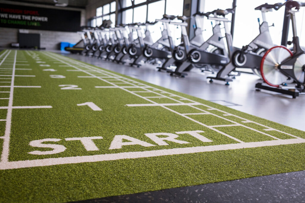 Indoor training gym with synthetic turf installation