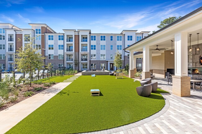 common courtyard areas with artificial turf, synthetic lawns for relaxing and playing