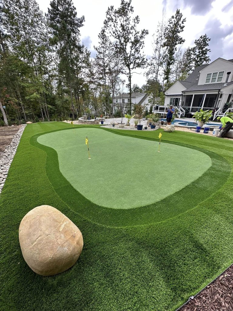 Backyard putting green installed by 50 Shades of Green