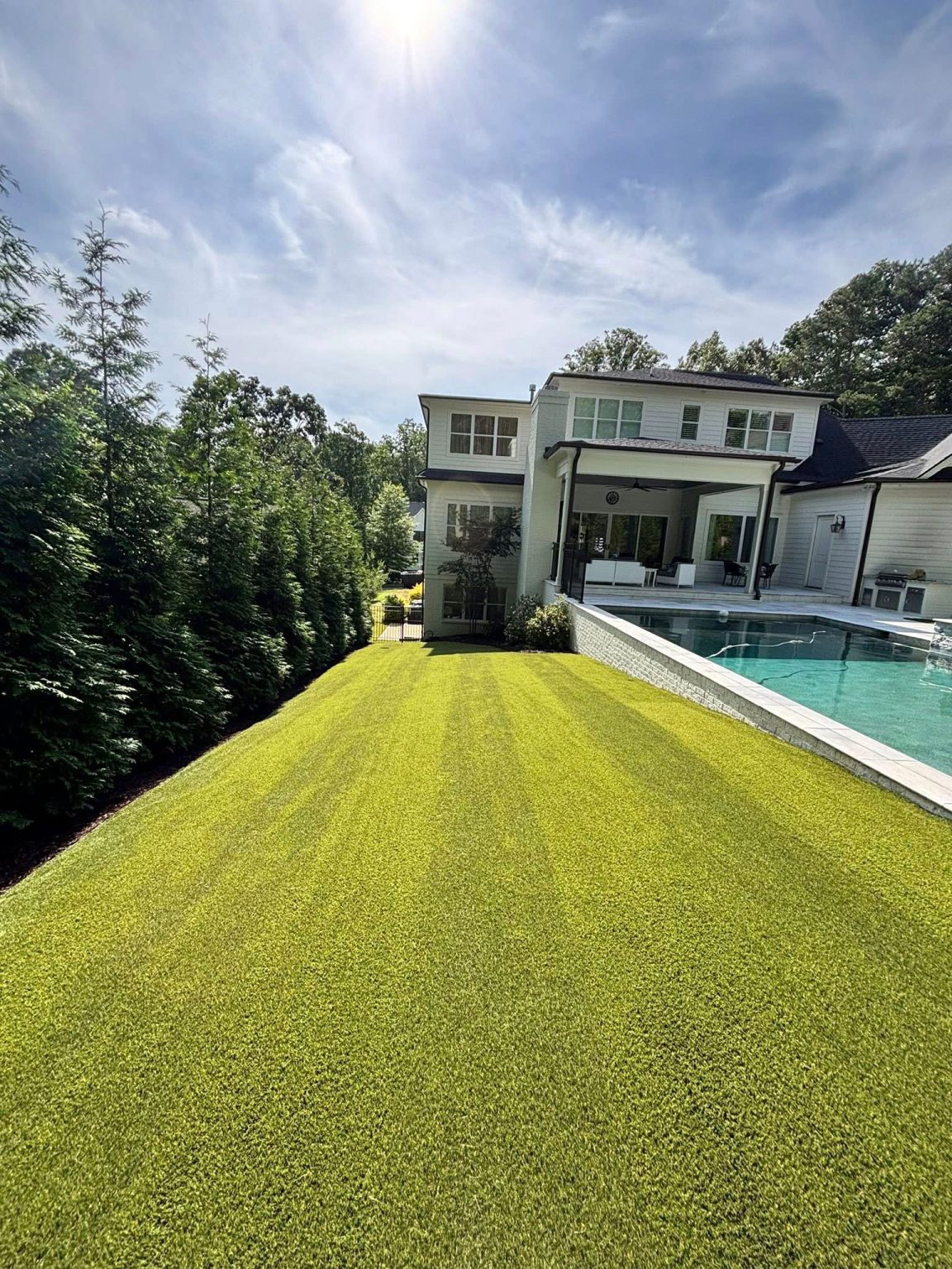 Artificial lawn by the pool