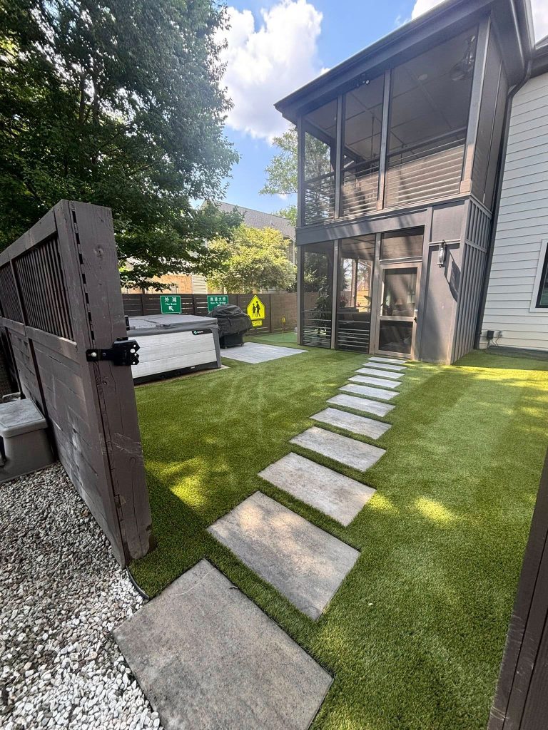 Artificial lawn installed in backyard that had drainage issues